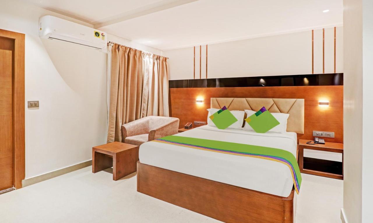 Treebo Emora Grand Hotel Yelahanka Exterior photo