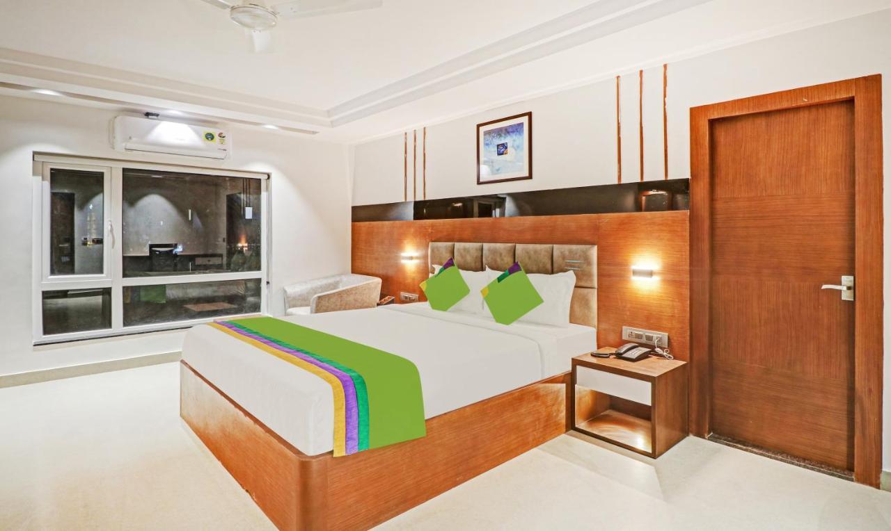 Treebo Emora Grand Hotel Yelahanka Exterior photo