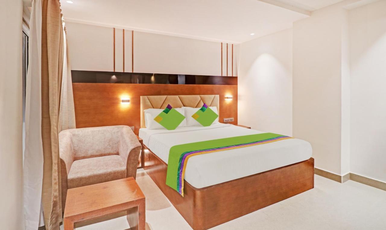 Treebo Emora Grand Hotel Yelahanka Exterior photo